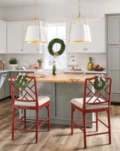 Festive holiday touches with wreaths on a barstool