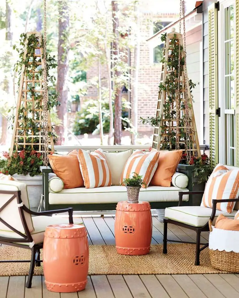 Swing on covered porch at Southern Living Idea House